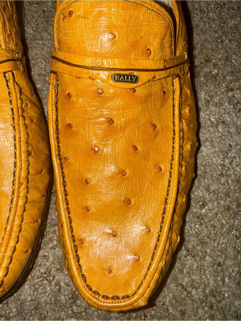 Bally of Switzerland genuine ostrich leather dress loafers.